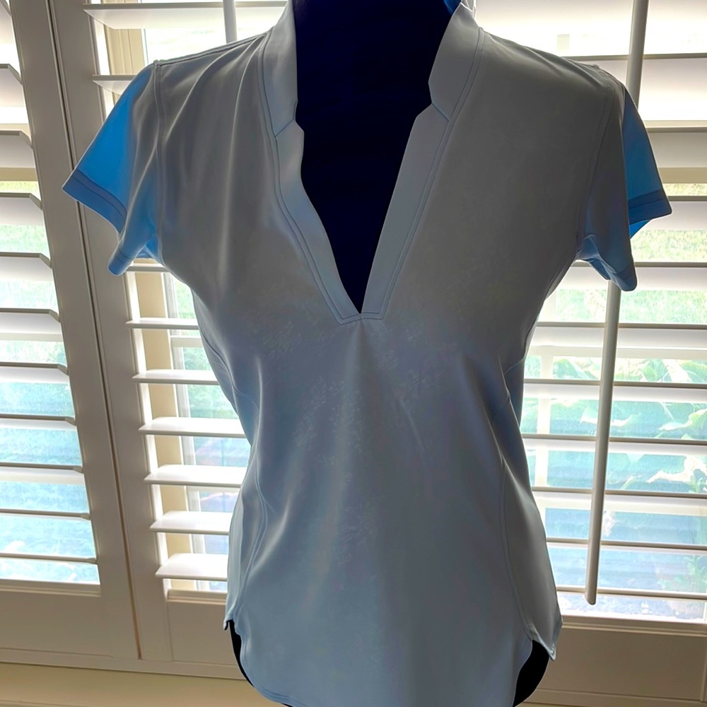 Ladies Pebble Beach size S Nwt pale blue with faint white print